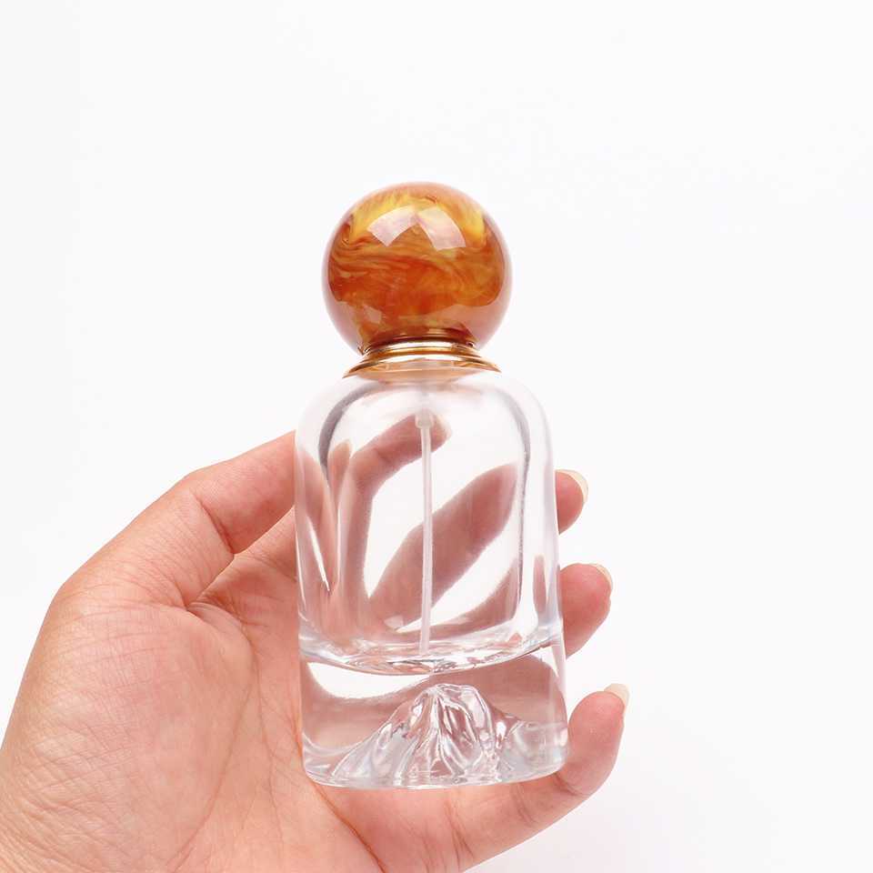 Custom clear 50ML oblate empty glass perfume bottle with colorful cap