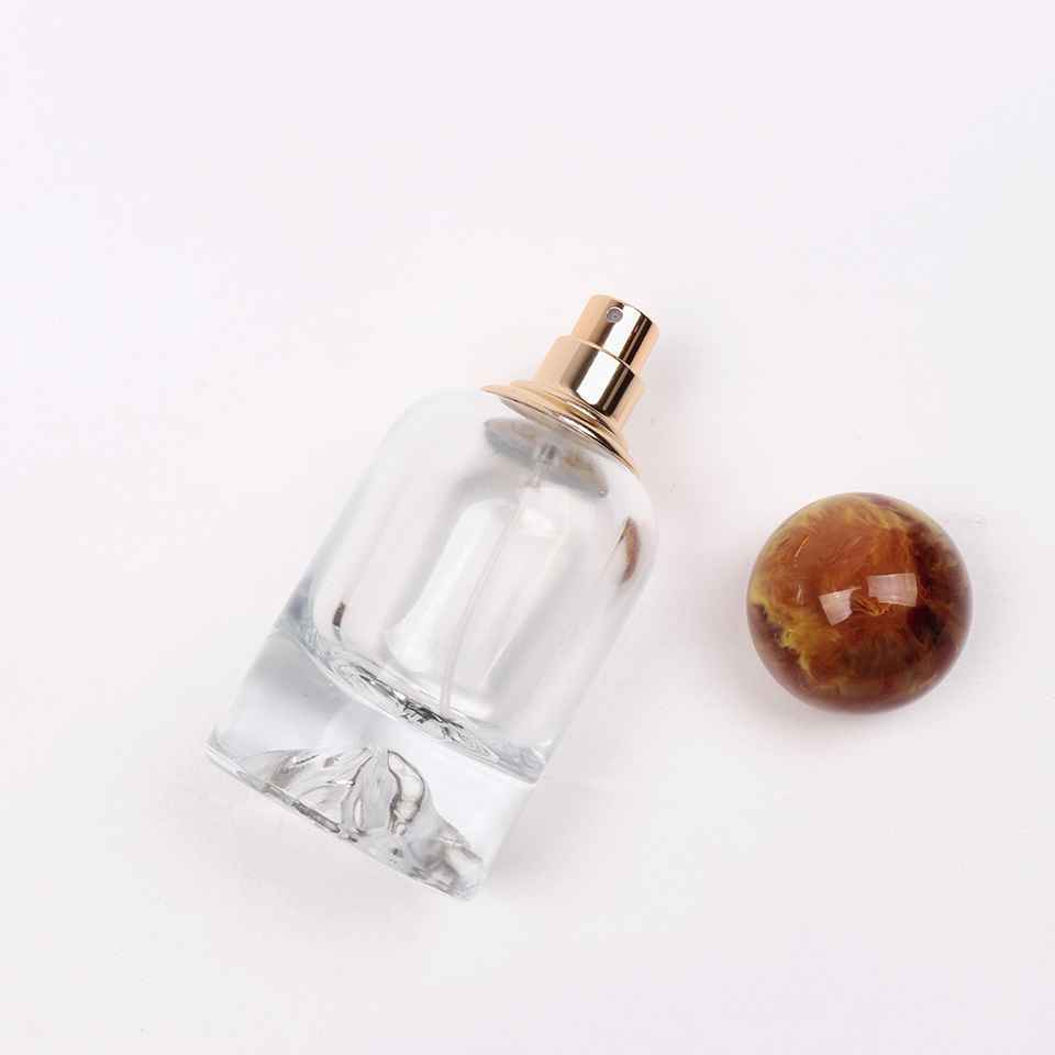 Custom clear 50ML oblate empty glass perfume bottle with colorful cap